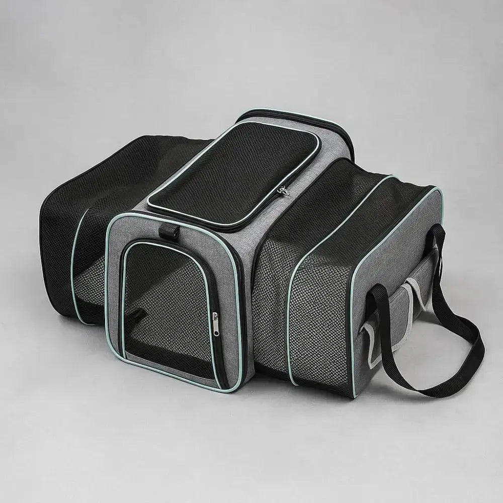 Sac de transport pour chat XXL extensible en tissu Oxford gris avec panneaux respirants.