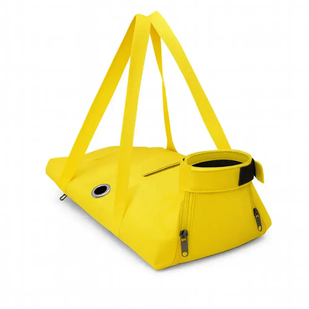 Sac de transport pour chat jaune en nylon respirant, utilisable à la main ou en sac ventral, avec sangle solide et ouverture zippée.