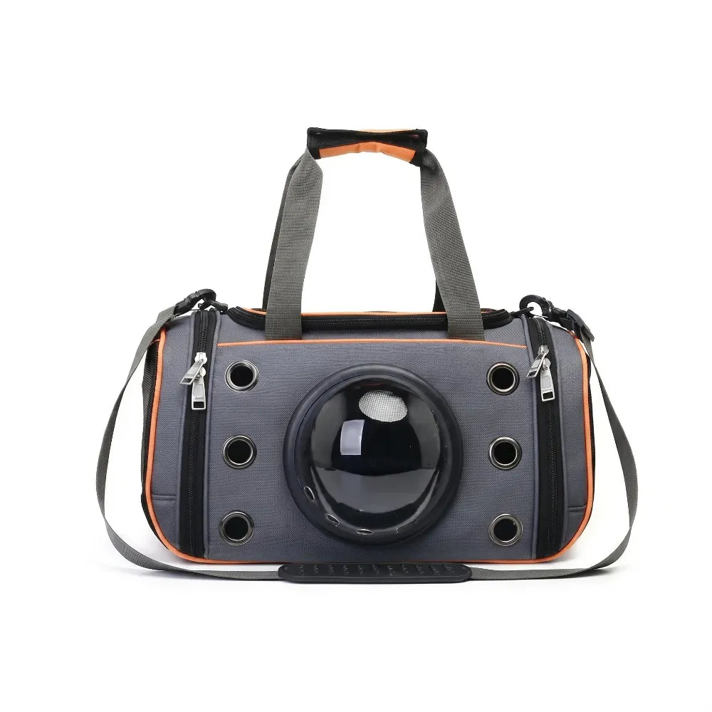 Sac de voyage pour chat gris et orange doté d'un hublot transparent et de multiples orifices d'aération.