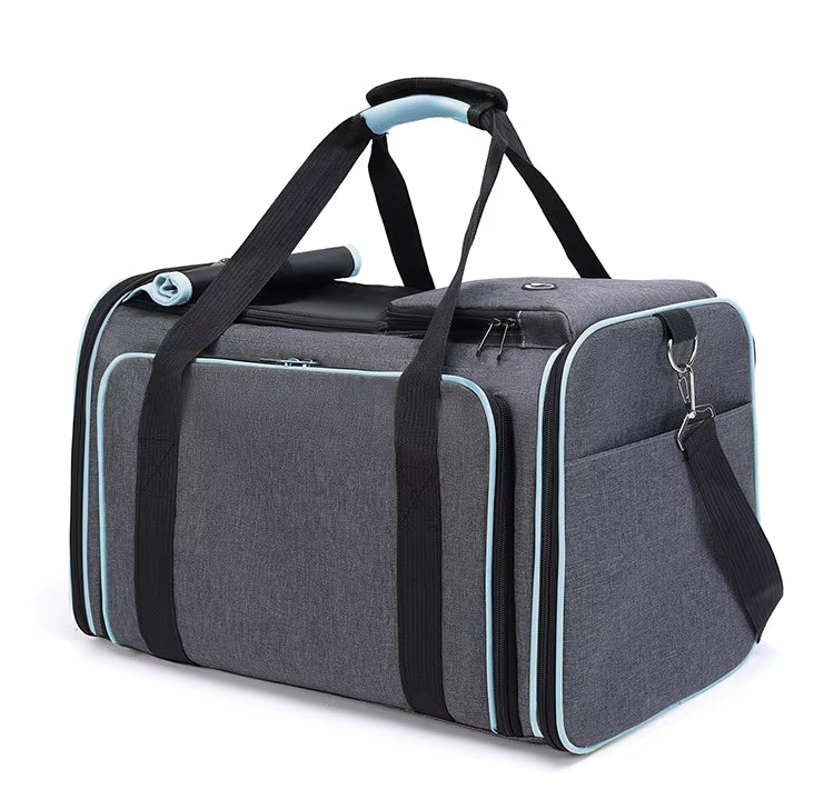 Sac de transport gris pour chat, vue de face avec poignées et ventilation.